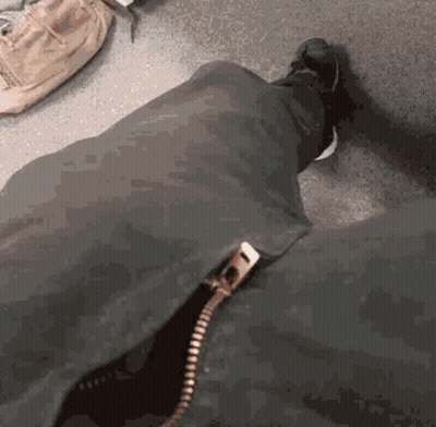 Close Up Of Leg With Zipper GIF