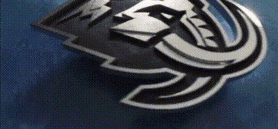 Close Up Of Logo On Blue Surface GIF