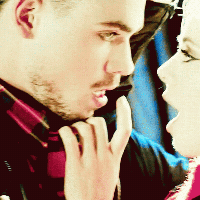 Close Up Of Man And Woman's Faces GIF