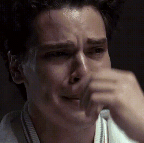 Close Up Of Man Crying With Hand On Face GIF