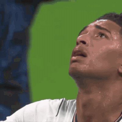 Close Up Of Man Face With Green Background GIF