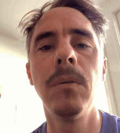 Close Up Of Man In Blue Shirt GIF