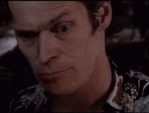 Close Up Of Man In Floral Shirt GIF