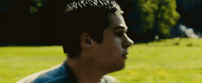 Close Up Of Man In Grassy Field GIF