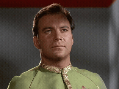 Close Up Of Man In Green Shirt GIF