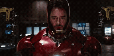 Close Up Of Man In Red And Gold Iron Man Suit GIF