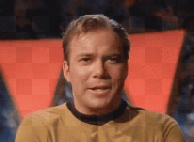 Close Up Of Man In Yellow Shirt And Black Collar GIF