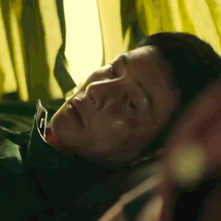 Close Up Of Man Laying On Bed With Eyes Closed And Mouth Open GIF