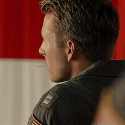 Close Up Of Man's Back With Patch On Jacket GIF