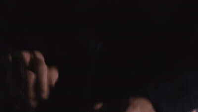 Close Up Of Man's Face Dark Background GIF