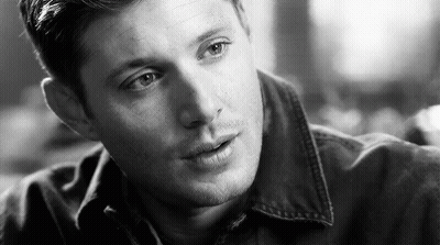Close Up Of Man's Face In Black And White Photo GIF