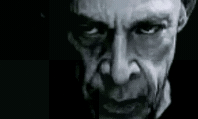 Close Up Of Man's Face In Black And White GIF