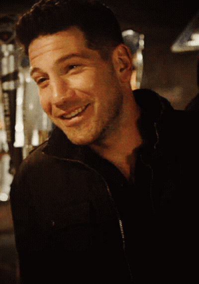 Close Up Of Man's Face In Black Jacket GIF