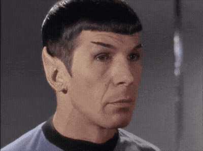 Close Up Of Man's Face In Blue Shirt GIF