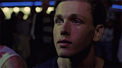 Close Up Of Man's Face In Dark Room GIF