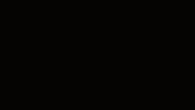 Close Up Of Man's Face In Dark Room GIF