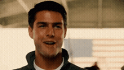 Close Up Of Man's Face In Gray Jacket GIF