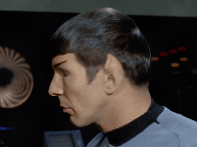 Close Up Of Man's Face In Gray Shirt GIF