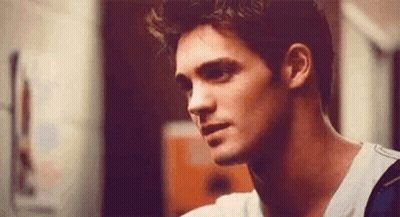Close Up Of Man's Face In Room GIF
