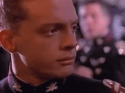 Close Up Of Man's Face In Suit GIF
