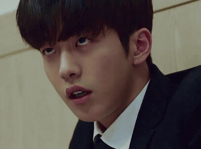 Close Up Of Man's Face In Suit And Tie GIF