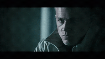 Close Up Of Man's Face In The Dark GIF