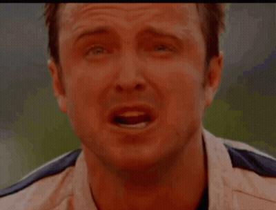 Close Up Of Man's Face In White Shirt And Black Tie GIF