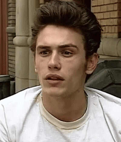Close Up Of Man's Face In White T-Shirt GIF
