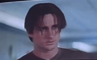Close Up Of Man's Face On TV GIF
