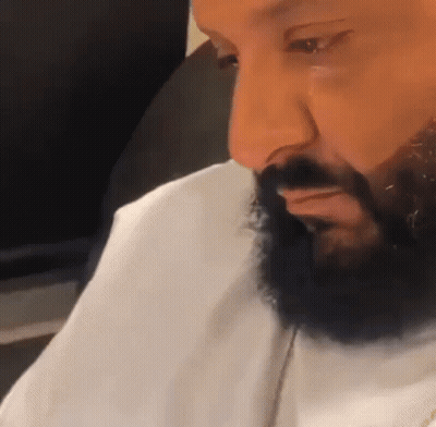 Close Up Of Man's Face With Beard And White Shirt GIF