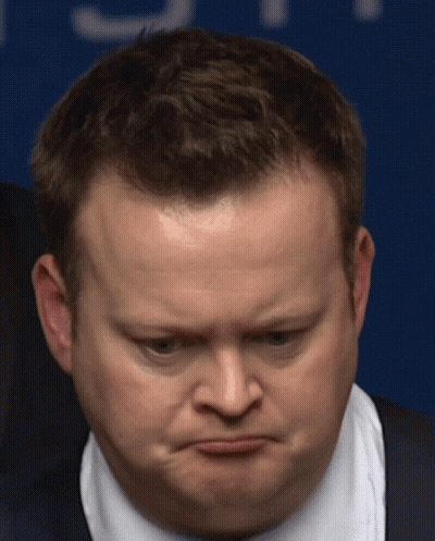 Close Up Of Man's Face With Blue Background GIF