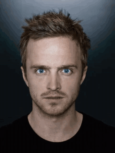 Close Up Of Man's Face With Blue Eyes And Beard GIF