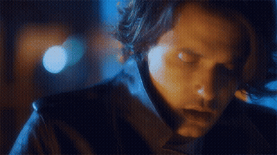 Close Up Of Man's Face With Blurry Background GIF