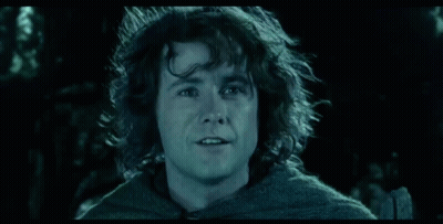 Close Up Of Man's Face With Dark Background GIF