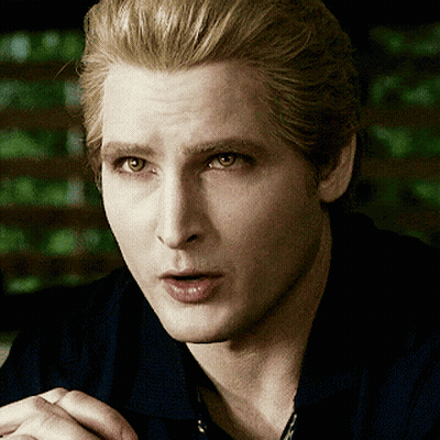 Close Up Of Man's Face With Dark Background GIF