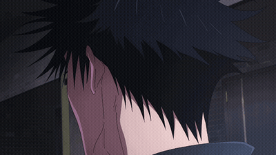 Close Up Of Man's Face With Dark Background GIF