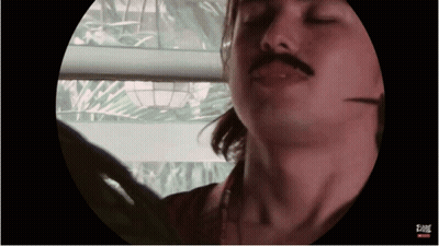 Close Up Of Man's Face With Fame Text GIF