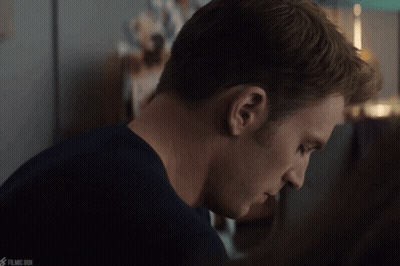 Close Up Of Man's Face With Filmc Box Watermark GIF