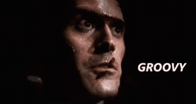 Close Up Of Man's Face With Groovy Text GIF