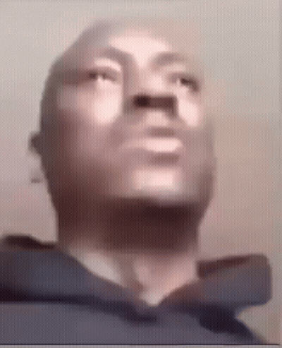 Close Up Of Man's Face With Hoodie GIF
