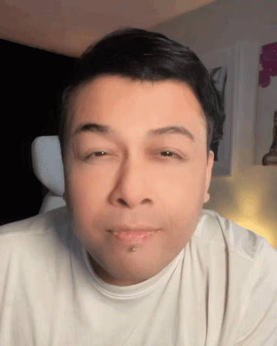 Close Up Of Man's Face With Lip Piercing GIF