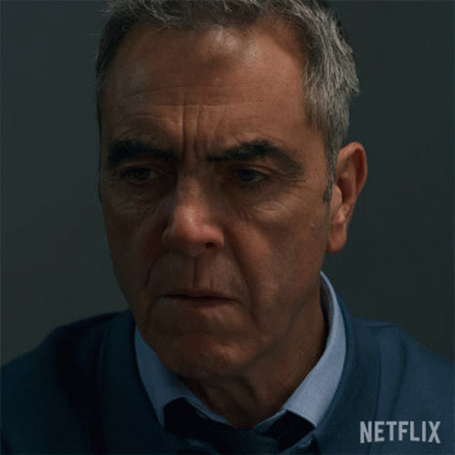 Close Up Of Man's Face With Netflix Logo GIF