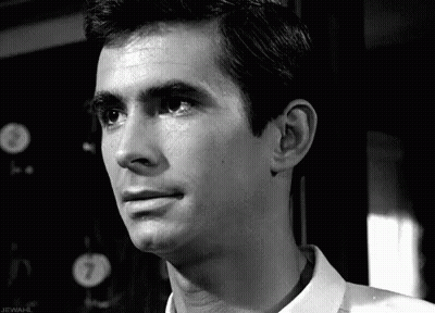 Close Up Of Man's Face With Number 7 GIF