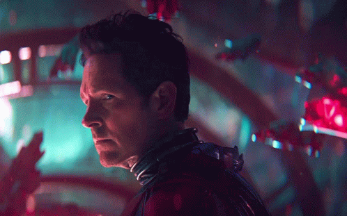Close Up Of Man's Face With Red And Blue Background GIF