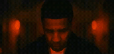 Close Up Of Man's Face With Red And Blue Lights GIF
