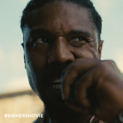 Close Up Of Man's Face With Sinners Movie Hashtag GIF