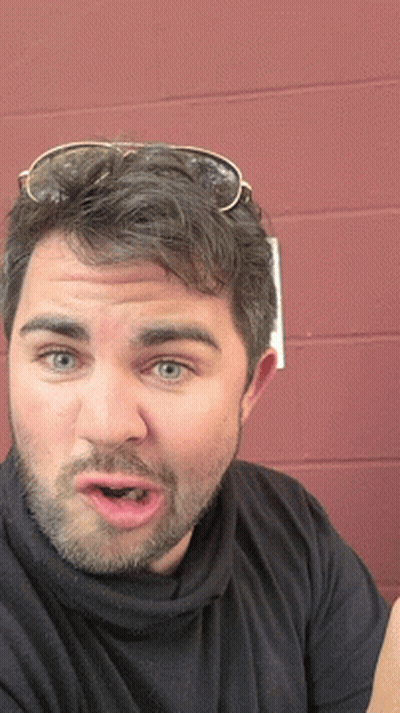 Close Up Of Man's Face With Sunglasses GIF