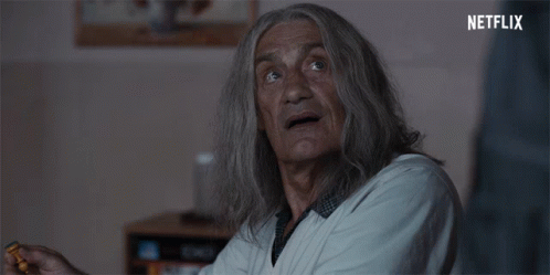 Close Up Of Man's Face With The Hills GIF