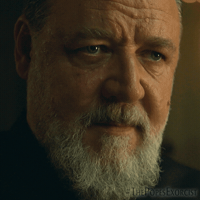 Close Up Of Man's Face With The Popes Exorcist GIF