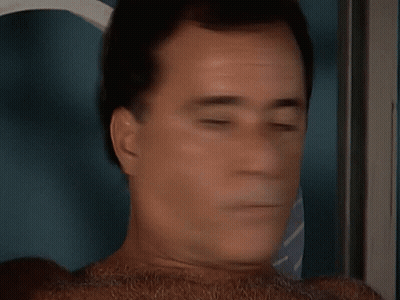 Close Up Of Man's Face With Tie GIF